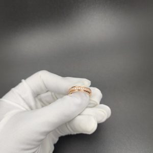 The count turned the ring full of diamonds.